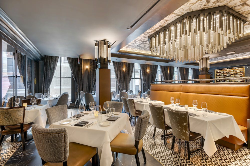 a room filled with furniture and a large window