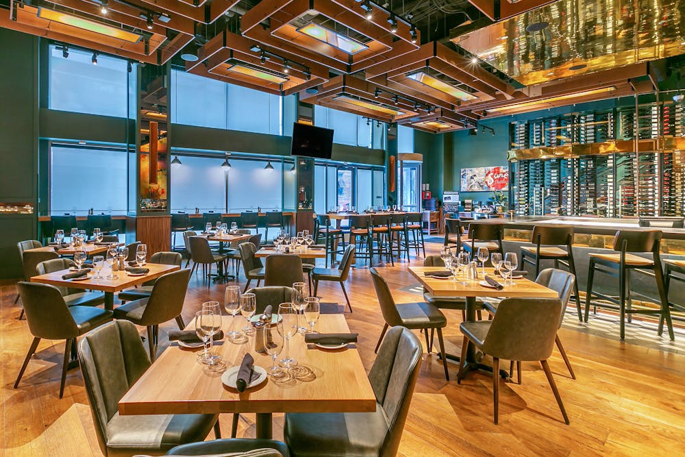 a room filled with furniture and a large window