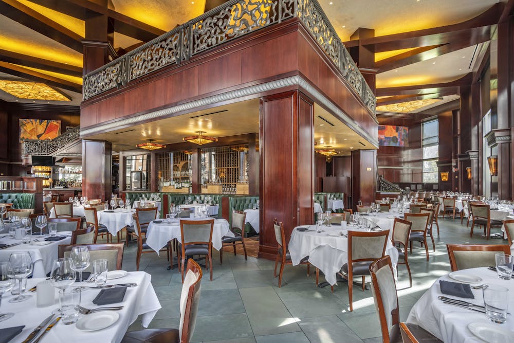 a room filled with furniture and a large window